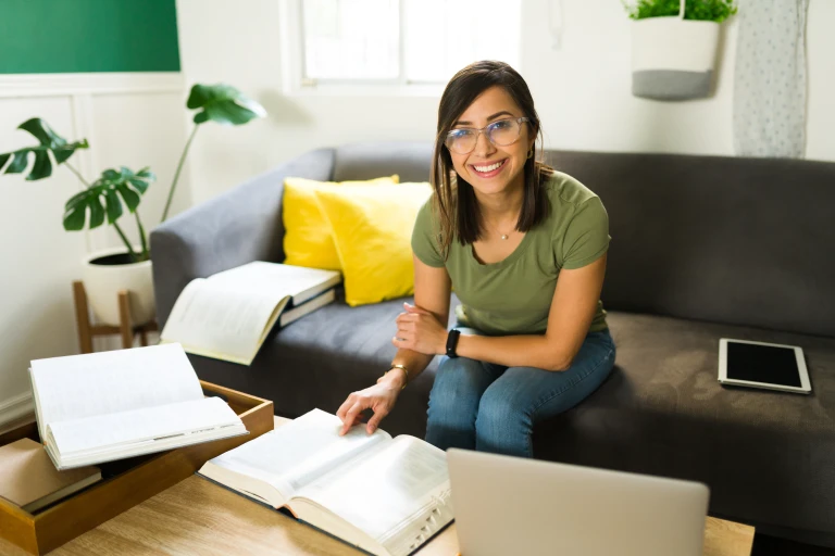 portrait happy mid adult smiling looking camera while studying university tests